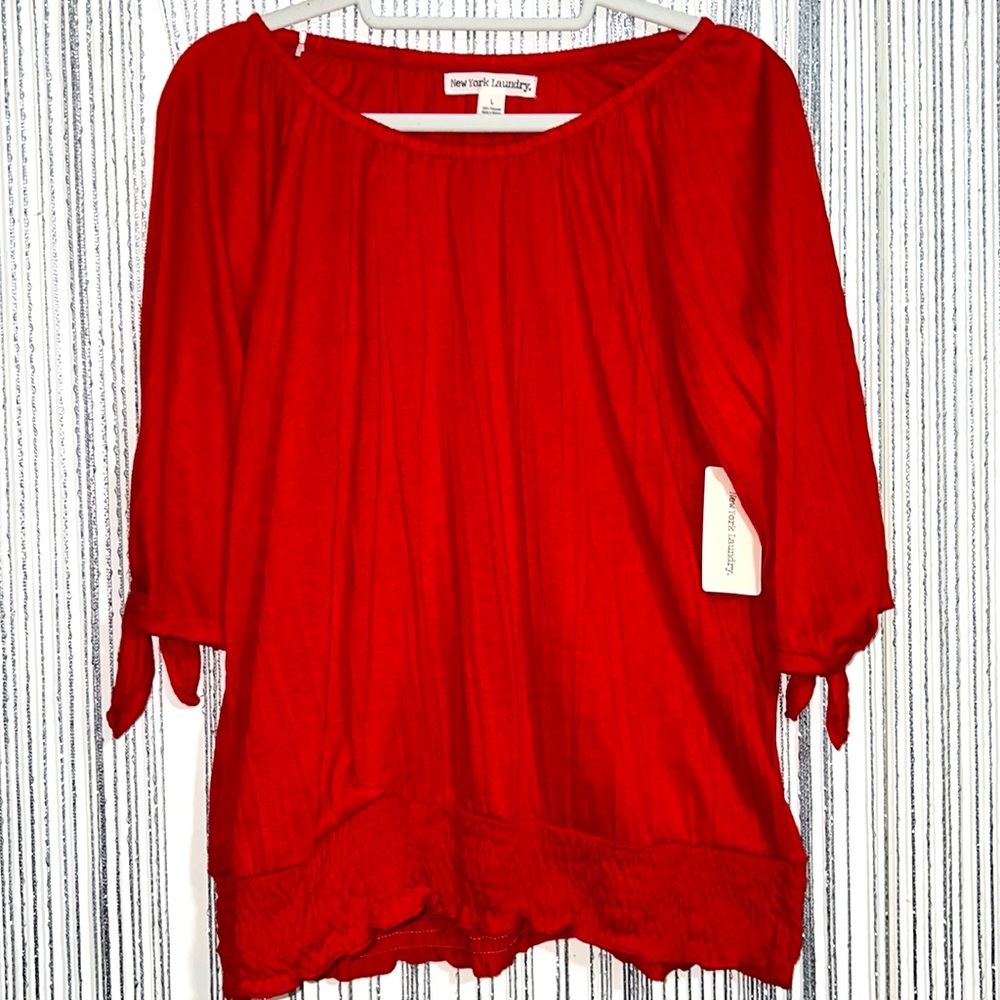 New red on or off the shoulder top. New with tags size Large